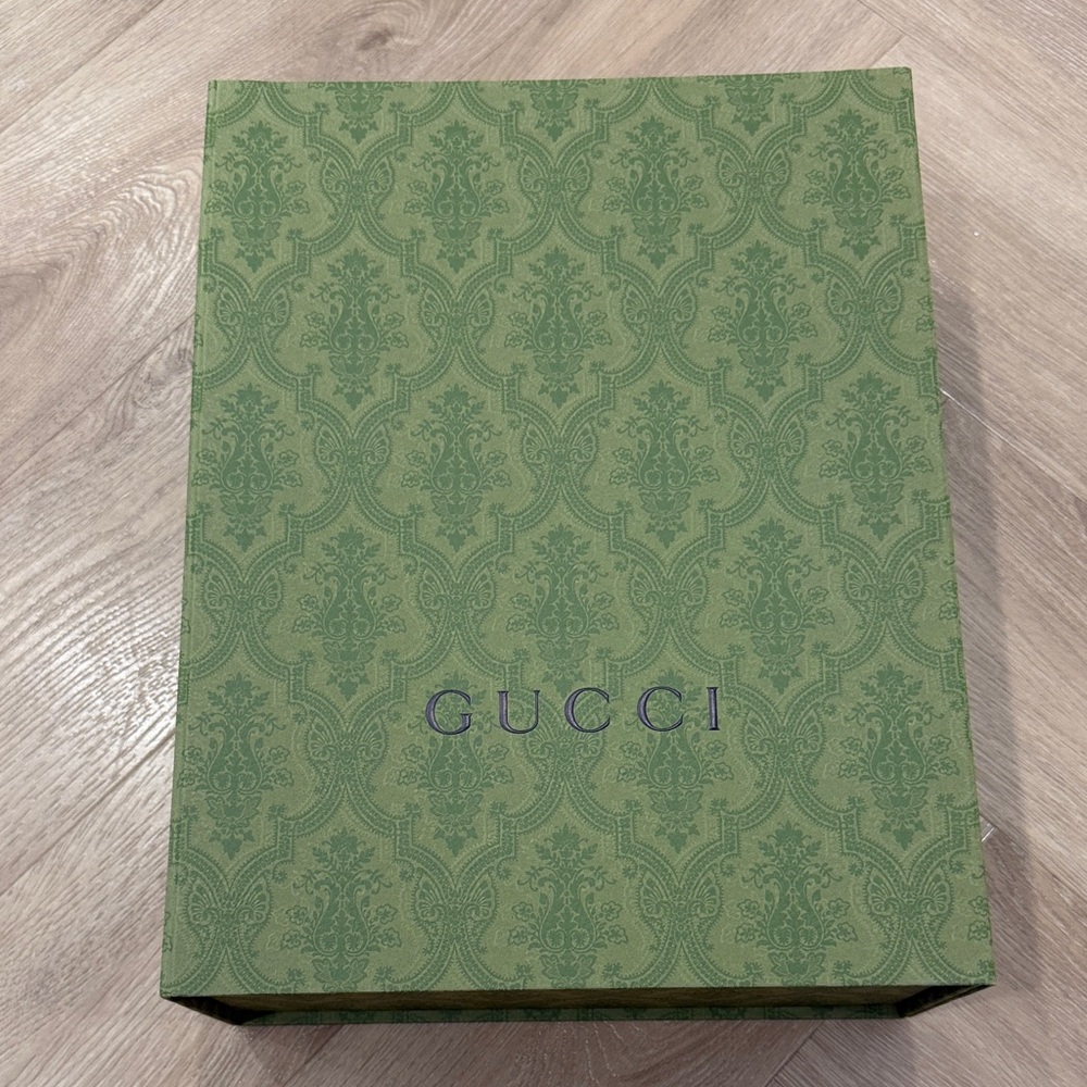 Gucci Box with dust bag. Mint condition. 36x28x12cm